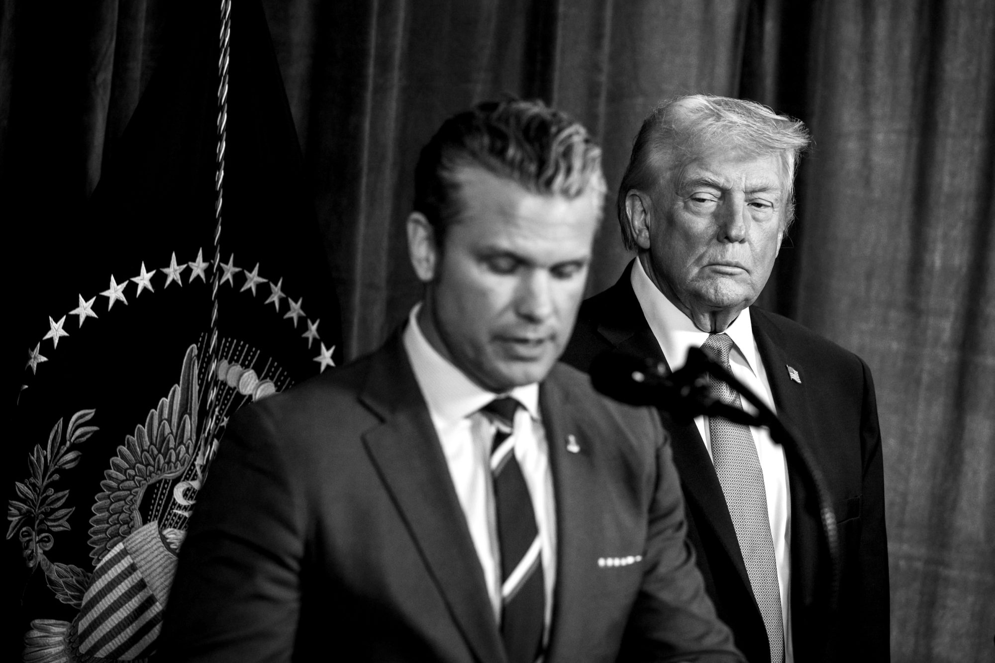 Secretary of War Pete Hegseth answers questions as President Donald Trump