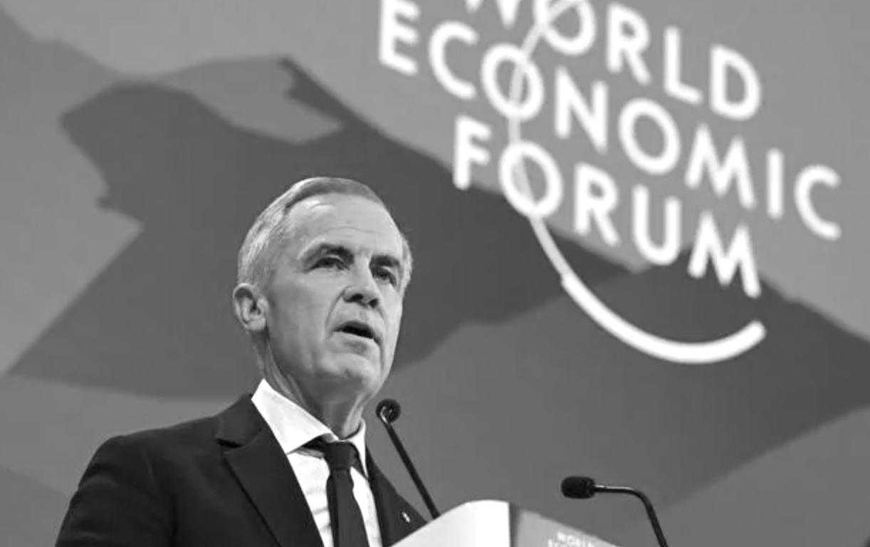 Canadian Prime Minister Mark Carney speaking at podium