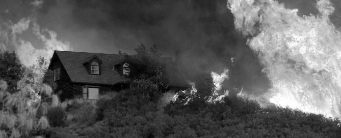 wildfire approaching suburban homes